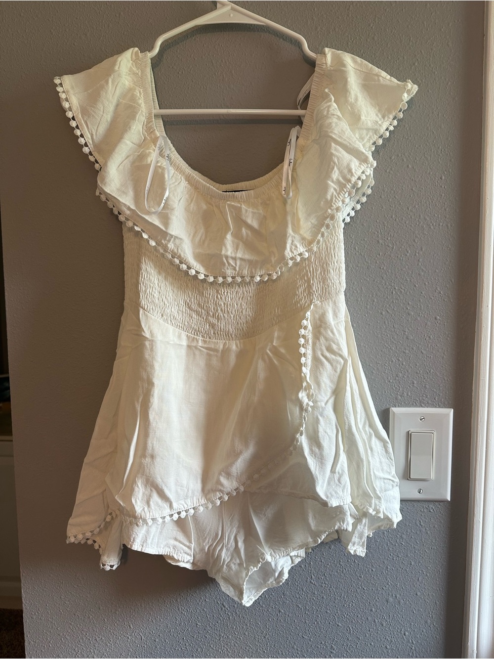 Lulu's Ivory Pom-Pom Trim Off-Shoulder Romper